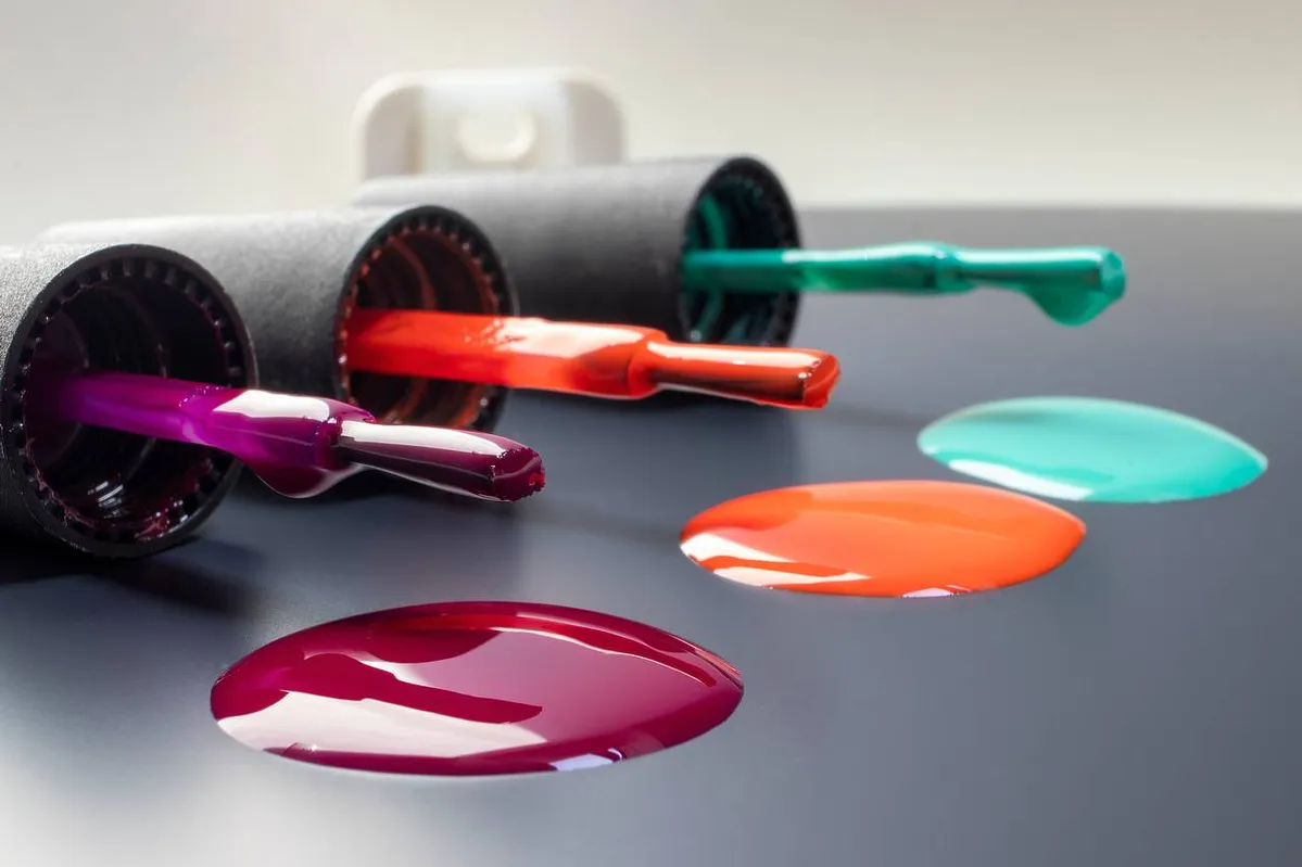 nail polish different colors spilled colorful nail polish bottles wp